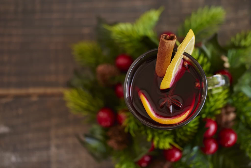 DIY hot chocolate station with marshmallows and cinnamon sticks for winter wedding