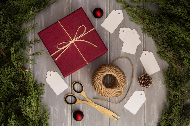 Winter wedding guest favors in the form of personalized ornaments.