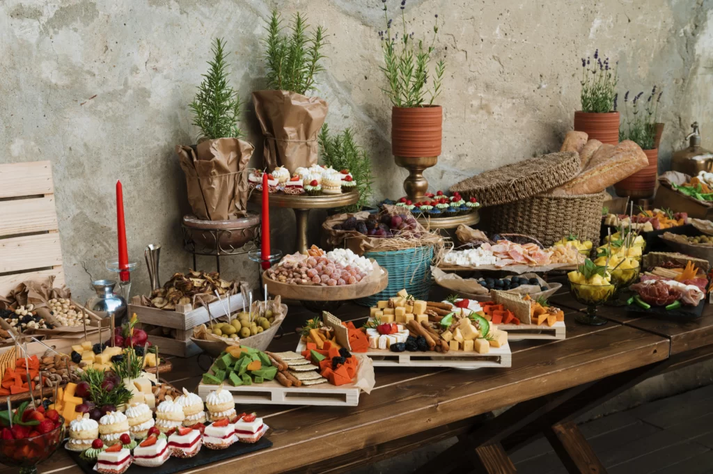Catering Trends - A modern event setup showcasing a grazing table and interactive food stations in a stylish setting.