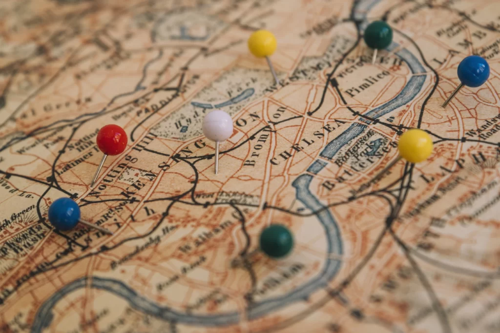 A map with pushpins marking guest locations.