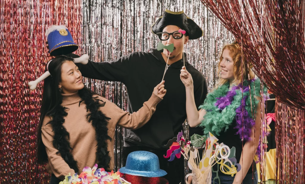 Birthday party photo booth with fun props and decorations