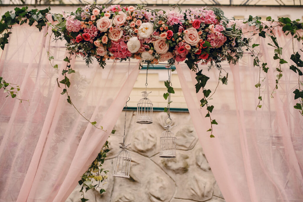 Cherry blossom wedding arch with pink and white flowers for spring ceremony in Washington DC