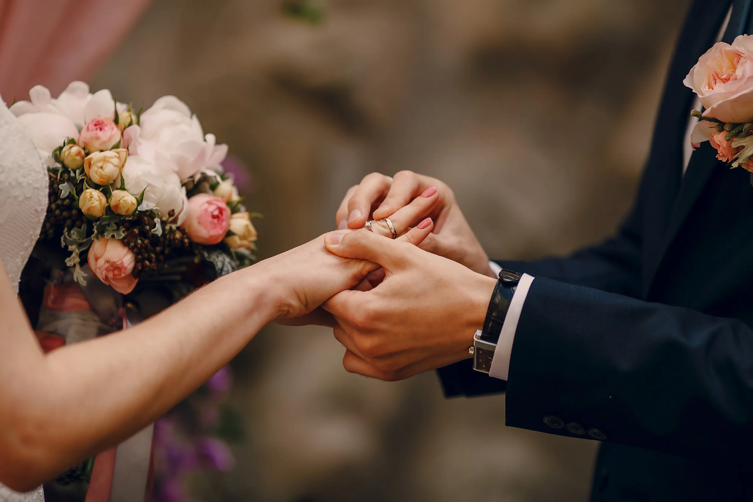 Couple exploring wedding venue options in Washington DC on a digital device